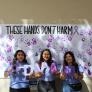 Strength United members holding letters which read &quot;#DVAM&quot;