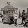 Palanquin with bride being carried to wedding on country road leading to Tienstin, spring 1946