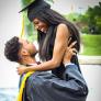 Black man and woman celebrating college graduation