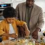 father and son cooking