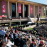 students attend their commencement in front of the oviatt library