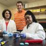 CSUN biology professor Jonathan Kelber, shown here with biology graduate student Yvess Adman (left) and biology graduate student Malachaia Hoover (right)