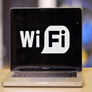 Image of a laptop screen displaying the words &quot;Wi-Fi&quot;. 
