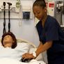 nursing student practices on mannequin