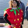 man in a strawberry costume