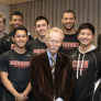 Professor James Sefton with members of the CSUN men&#039;s volleyball team