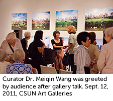 Curator Dr. Meiqin Wang greeted by audience 