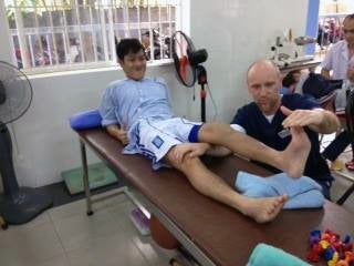 csun pt student works on patient in vietnam