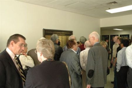 Image of people staying around at the ceremony
